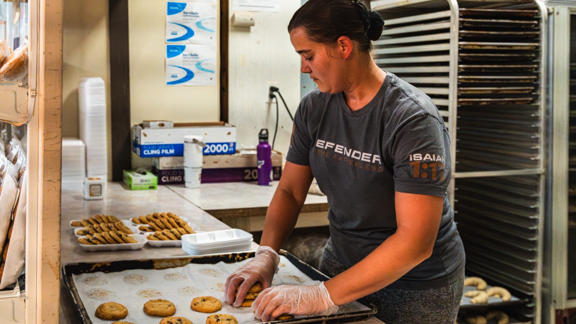 Fresh cookies going onto a tray at Sunrise Bakery, PA Dutch Farmers Market
